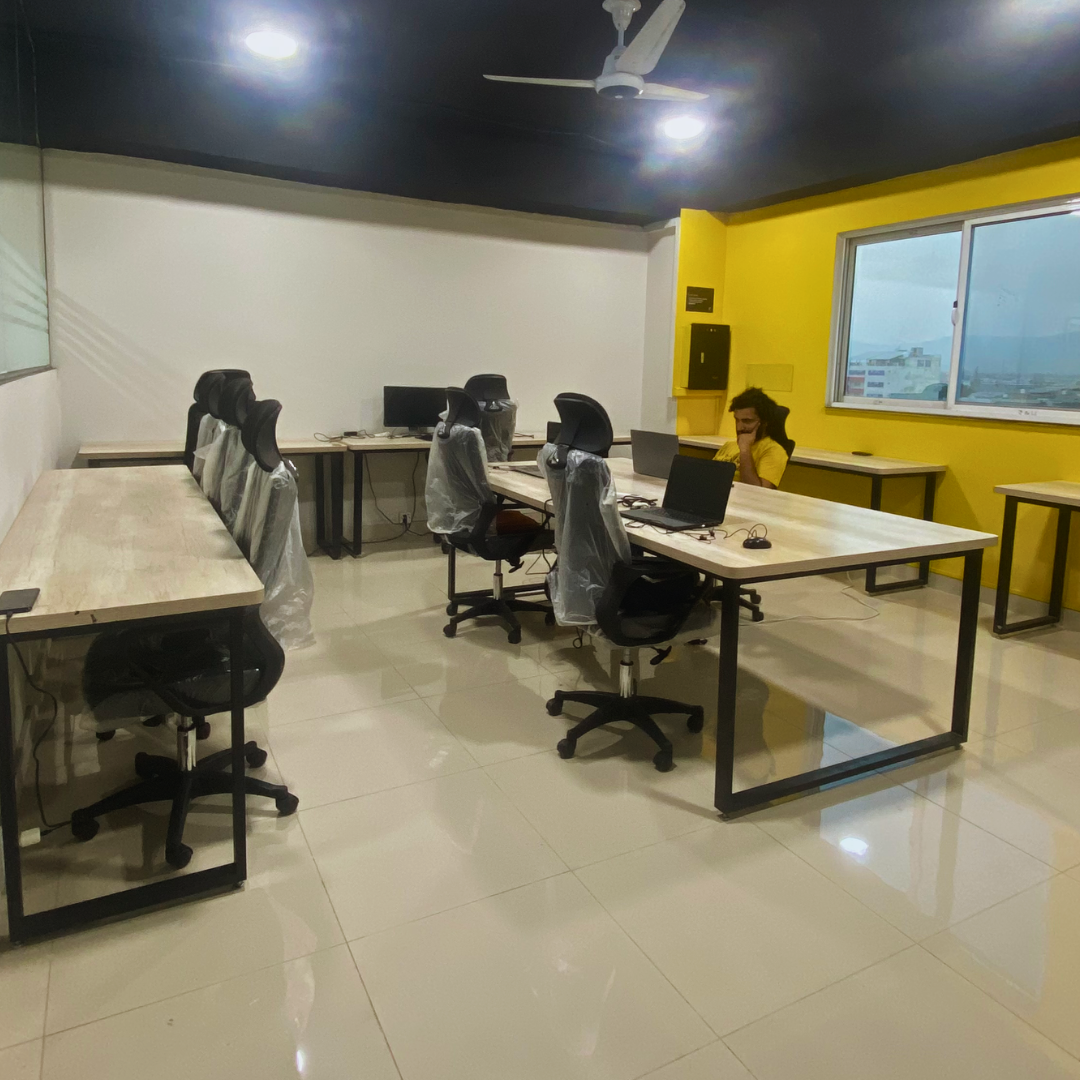 Meeting room seating and workspace at FounderSpace